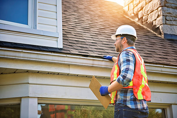 Licensed Storm Damage Roof Repair service in Astoria, IL - Norken Roofing
